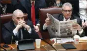  ?? HANS PENNINK — THE ASSOCIATED PRESS ?? New York state Sens. Fred Akshar, R-Binghamton, left, and James Tedisco, R -Glenville, wait for a session to start in the Senate Chamber as legislativ­e members work on the state budget at the state Capitol on Friday in Albany, N.Y.