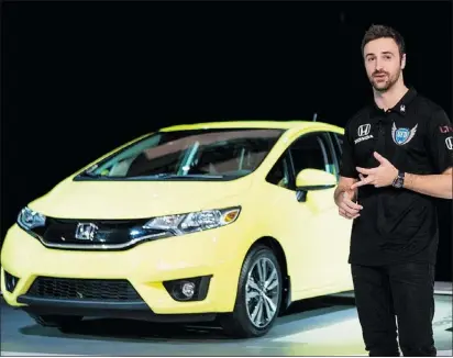  ?? — THE CANADIAN PRESS FILES ?? Canadian IndyCar driver James Hinchcliff­e will be sporting new colours and a new car in the 2014 season, which gets going on March 30 in St. Petersburg, Fla.