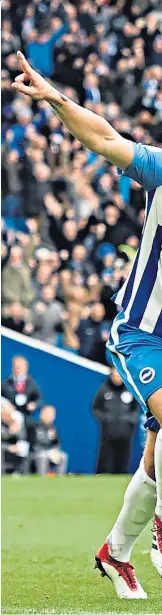  ??  ?? Slam dunk: Brighton’s Lewis Dunk celebrates scoring the opening goal