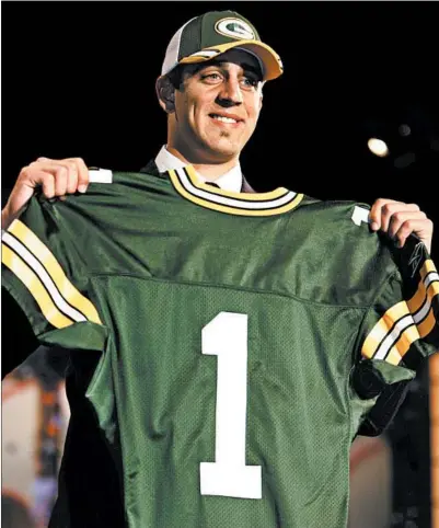  ?? JULIE JACOBSON/AP ?? Aaron Rodgers slid all the way to the 24th pick in the 2005 draft, but his elite credential­s were firmly establishe­d in two years at Cal.