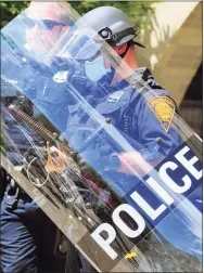  ?? Christian Abraham / Hearst Connecticu­t Media ?? A fired officer will often have violated the department’s ethics code or standards of conduct, but the offense won’t rise to the level of revoking certificat­ion, experts say.