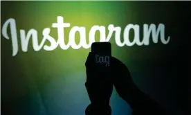  ??  ?? The initiative comes after Instagram has come under fire for not doing enough to tackle online bullying. Photograph: Marcio Jose Sanchez/AP