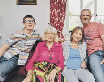  ??  ?? Helen Harber at home in Werrington with her son Luke (15), husband Stephen and mum Shirley