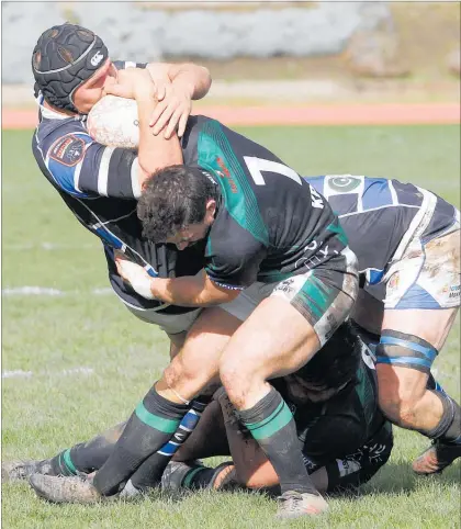  ??  ?? He’s not letting go of that ball! A piece of the action from Saturday’s match between Wanganui and South Canterbury.