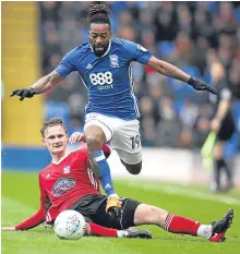  ??  ?? Jacques Maghoma skips over Callum Connolly’s tackle