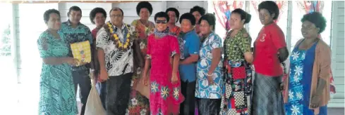  ??  ?? Nadogo Central College principal Mohammed Saiyaz Khan (with garland) with the women of Dogotuki district during the handover of dignity packs.