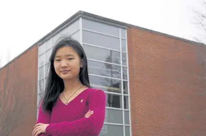  ?? By Philip Marcelo The Associated Press Steven Senne, The Associated Press ?? “I’m feeling trapped at home,” Grace Hu, 16, of Sharon, Mass., said of planning to go back to in-person classes this month. “I just want to see my classmates again.”