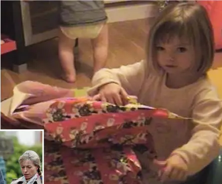  ??  ?? Christmas delight: Madeleine unwraps a present in a still from a family video