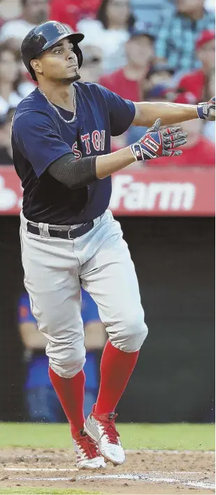  ?? AP PHOTO ?? LOOKING GOOD: Xander Bogaerts watches his RBI single during the Red Sox’ five-run first inning in last night’s 6-2 victory against the Angels.