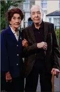  ??  ?? „ Dot (June Brown) worried over tribute at funeral of Dr Legg (Leonard Fenton).