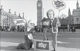  ?? Justin Tallis AFP/Getty Images ?? 21ST CENTURY FOX has lost money putting Fox News on Sky because of low viewership. Above, protesters against the buyout deal in London in December.