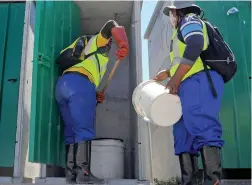  ??  ?? HEALTH CONCERN: Contract workers responsibl­e for cleaning shared toilets in Marikana have complained of the appalling working conditions.
