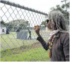  ?? PHOTOGRAPH­ER NICHOLAS NUNES/ ?? Right: Neville Tennant, otherwise known as ‘Bionic’, said that he came for a last view of the send-off for the late Frederick ‘Toots’ Hibbert after his internment at National Heroes Park on Sunday.