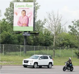  ?? TROY FLEECE / REGINA LEADER-POST ?? A billboard for MLA Laura Ross, displayed on Lewvan Drive in Regina, no longer displays the party colours or a Saskatchew­an Party email address.