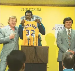  ?? WARRICK PAGE/HBO ?? John C. Reilly, from left, as Dr. Jerry Buss, Quincy Isaiah as Magic Johnson and Jason Clarke as Jerry West in “Winning Time: The Rise of the Lakers Dynasty.”