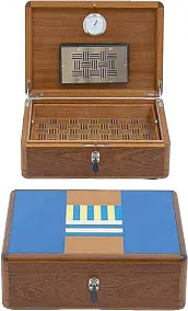  ??  ?? H Casaque boxes, created by studio Hermès: Structure in mahogany and decoration in leather marquetry — Epsom calfskin, novillo bullcalf, pigmented goatskin and Evercolor calfskin, from the Hermès home collection 2019-2020