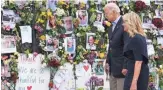  ?? AFP VIA GETTY IMAGES ?? President Joe Biden and first lady Jill Biden visit a memorial wall near the partially collapsed condo in Surfside, Fla., on Thursday.