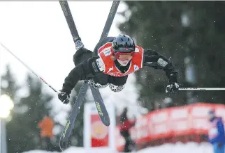  ?? ALBERTO PIZZOLI/AFP/ GETTY IMAGES FILES ?? Thanks in part to B2ten, a group of Canadian business leaders that helps athletes with their training needs, skier Jenn Heil won a moguls gold medal at the 2006 Winter Olympics.