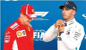 ??  ?? Sebastian Vettel (i) y Lewis Hamilton