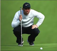  ?? JEFF GROSS — GETTY IMAGES ?? Paul Casey, who leads by three shots after three rounds, lines up a putt.