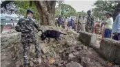  ?? — PTI ?? Army personnel inspect the site of a low- intensity bomb blast that took place at Panbazar in Guwahati on Saturday.