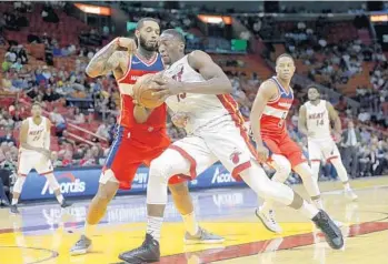  ?? AP/FILE ?? Kelly Olynyk and Bam Adebayo, above, found themselves side by side for nearly 10 minutes Wednesday night.