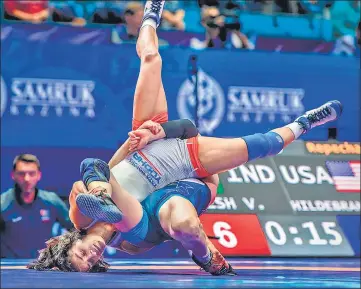  ?? PTI ?? Vinesh Phogat upset world No 1 wrestler Sarah Ann Hildebrand­t and then beat Maria Prevolarak­i of Greece to win bronze at Worlds.