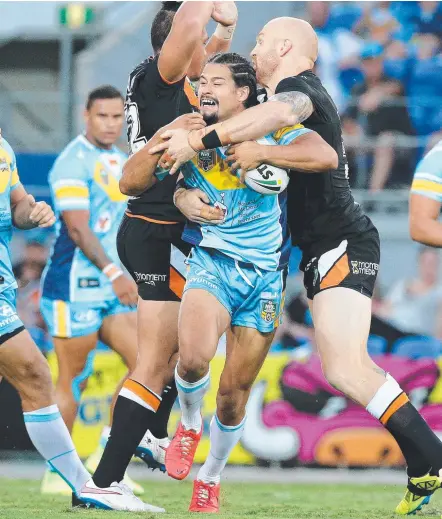  ??  ?? Kevin Gordon in action for the Titans against Wests Tigers in 2015, his final season in the NRL.