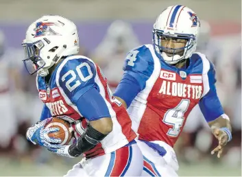  ?? JOHN MAHONEY ?? Alouettes quarterbac­k Darian Durant hands the ball to running back Tyrell Sutton, who rushed for just four yards total in Thursday’s 32-4 loss to the Redblacks. Sutton says the Als don’t like losing.