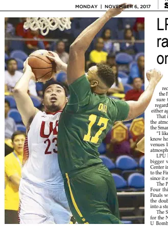  ?? MIGUEL DE GUZMAN ?? UE Red Warriors’ Alvin Pasaol shoots against FEU Tamaraws’ Prince Orizu during their UAAP game yesterday at the Smart Araneta Coliseum.