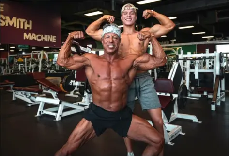  ?? COURTESY PHOTO ?? Steven Gutierrez, of Yuma, (left) and his son, Cole Gutierrez, perform the Double Biceps pose after a recent gym session.