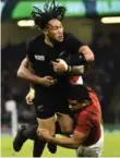  ?? LOIC VENANCE/AFP/GETTY IMAGES ?? New Zealand’s Ma’a Nonu is brought down hard on Saturday.