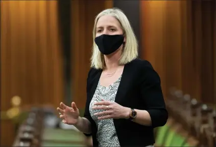  ?? CANADIAN PRESS PHOTO ?? Infrastruc­ture and Communitie­s Minister Catherine McKenna rises in the House of Commons following Question Period Monday March 22, 2021 in Ottawa.