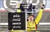  ??  ?? Michael McDowell, driver of the (34) Love's Travel Stops Ford, celebrates in victory lane after winning the NASCAR Cup Series 63rd Annual Daytona 500 on Sunday