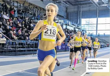  ??  ?? Leading Dorottya Csuta in front in the 1500 metres. Photo by Bobby Gavin