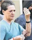  ??  ?? Congress Party President and chairperso­n of India’s UPA government Sonia Gandhi shows her marked finger after casting her vote at a polling centre in New Delhi. — AFP photo