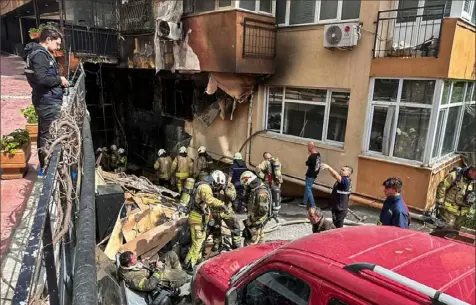  ?? IHA via AP ?? Firefighte­rs work Tuesday after a fire broke out at a nightclub in Istanbul, Turkey. The fire killed at least 29 people, officials said. Several people, including managers of the club, were detained for questionin­g.