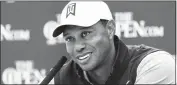  ?? ASSOCIATED PRESS ?? TIGER WOODS speaks at a press conference ahead of the start of the British Open golf championsh­ips earlier this year.