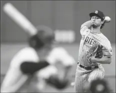  ?? GENE J. PUSKAR/AP ?? SAN DIEGO PADRES STARTING PITCHER YU DARVISH delivers during the first inning of a game against the Pittsburgh Pirates in Pittsburgh on Monday.