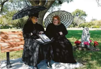  ?? Photos by Kirk Sides / Staff photograph­er ?? Natasha Morse and Julie Langford describe funerary practices of the early 1900s during the Voices of the Past event at Crown Hill Cemetery in Pasadena.