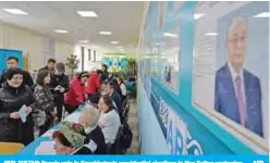  ?? — AFP ?? NUR-SULTAN: People vote in Kazakhstan’s presidenti­al elections in Nur-Sultan yesterday.