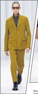  ??  ?? Model at Paul Smith show in Paris last month sports a suit with a twist and a more casual look, while Primal Scream rocker Bobby Gillespie is still a fan of sharp tailoring