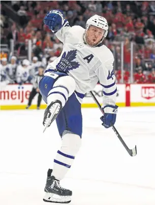  ?? JONATHAN DANIEL GETTY IMAGES ?? On the ice and off, Morgan Rielly gives his Maple Leafs teammates a boost. “On the ice, you see it, it’s a lot of fun being out there with him, joking around,” said Mitch Marner.