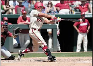  ?? NWA Democrat-Gazette/J.T. WAMPLER ?? Arkansas’ Dominic Fletcher went 2 for 4 with 2 runs and 4 RBI in the Razorbacks’ 9-7 victory Sunday against Alabama at Baum Stadium in Fayettevil­le. Fletcher’s three-run home run in the fifth inning put Arkansas up 8-7.
