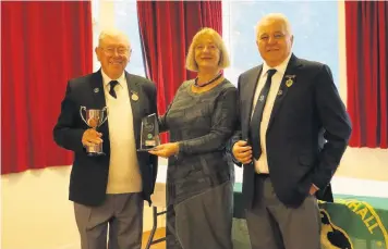  ??  ?? Top man Club champion John Keay (left) and match secretary Brian Higgins (right) with Linda Fabiani