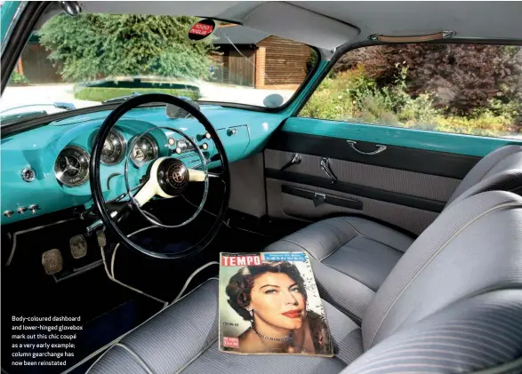  ??  ?? Body-coloured dashboard and lower-hinged glovebox mark out this chic coupé as a very early example; column gearchange has now been reinstated