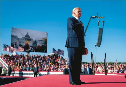  ?? EVAN VUCCI/AP ?? Donald Trump appears at a rally Saturday in Waco, Texas, in front of footage from the Jan. 6, 2021, Capitol riot.