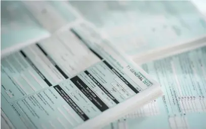  ??  ?? Tax experts say big changes in a return or claims that seem unusual for someone with a particular job or living in a certain neighbourh­ood can increase the chances of an audit. Graeme Roy/The