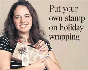  ?? RICHARD LAUTENS PHOTOS TORONTO STAR ?? Monika Giacca of Owl Paper Goods demonstrat­es the steps for making custom rubber stamps for wrapping paper and labels. In this case, she carved a rubber stamp in the form of a pine cone.