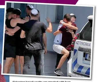  ??  ?? Sickening: Israeli youths are greeted with hugs after being released from police custody Picture: AP PHOTO/PETROS KARADJIAS